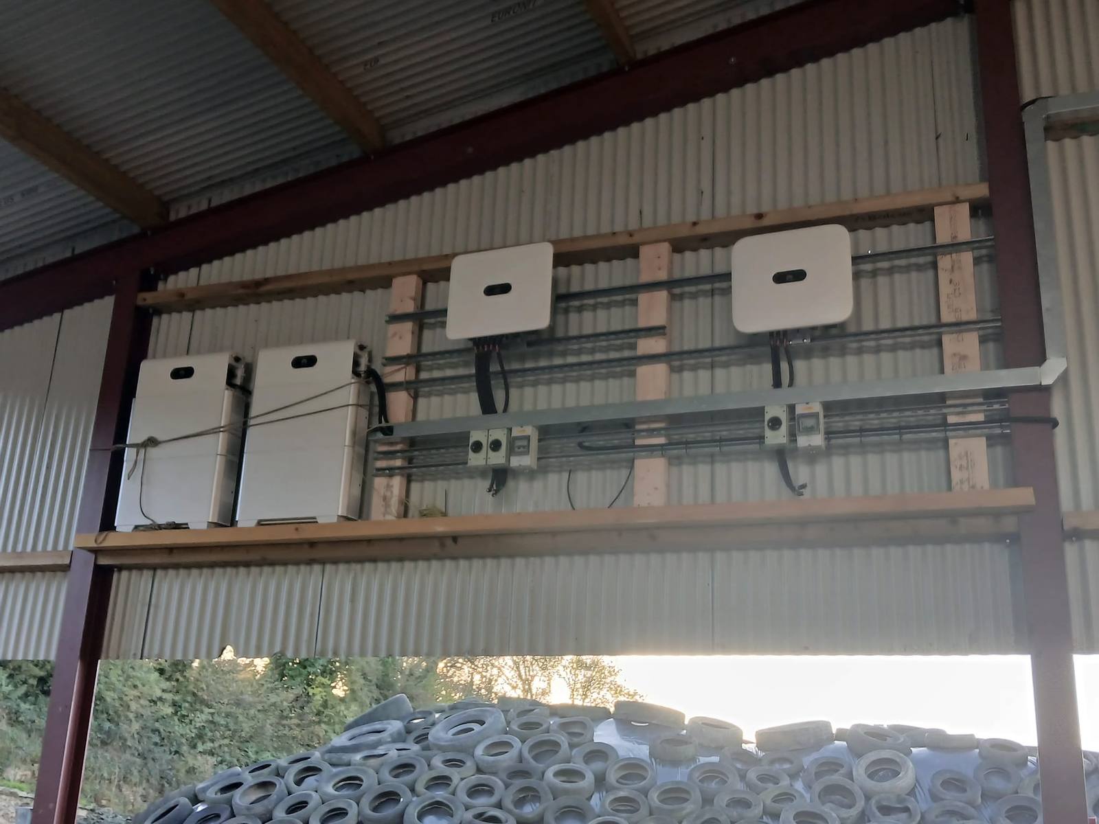 Inverters and battery storage wired clean on a shed wall in Co. Cork, installed by CTS Solar